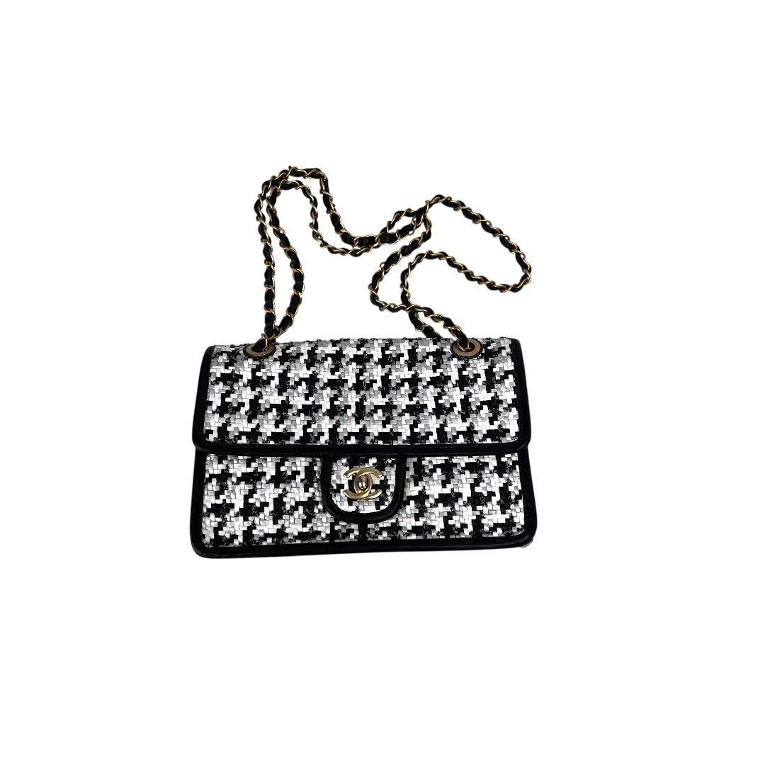 Chanel 2023 medium woven flap bag