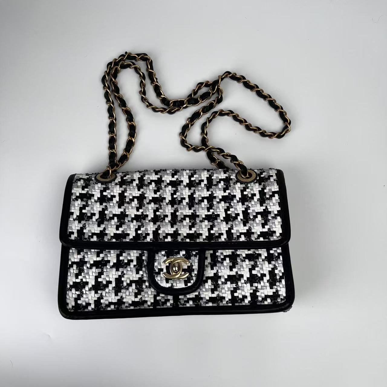 Chanel 2023 medium woven flap bag