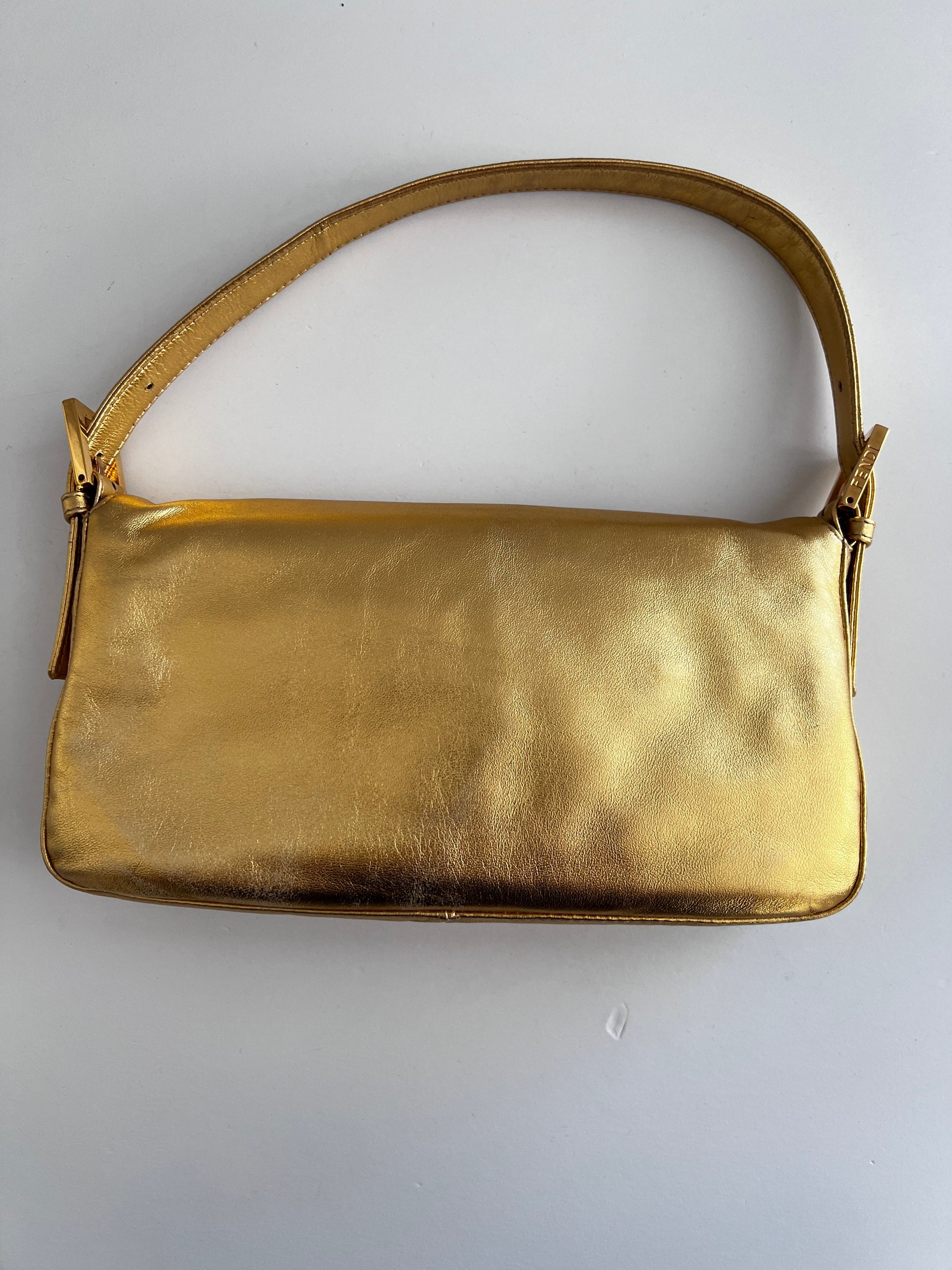 Classic vintage Fendi gold baguette
