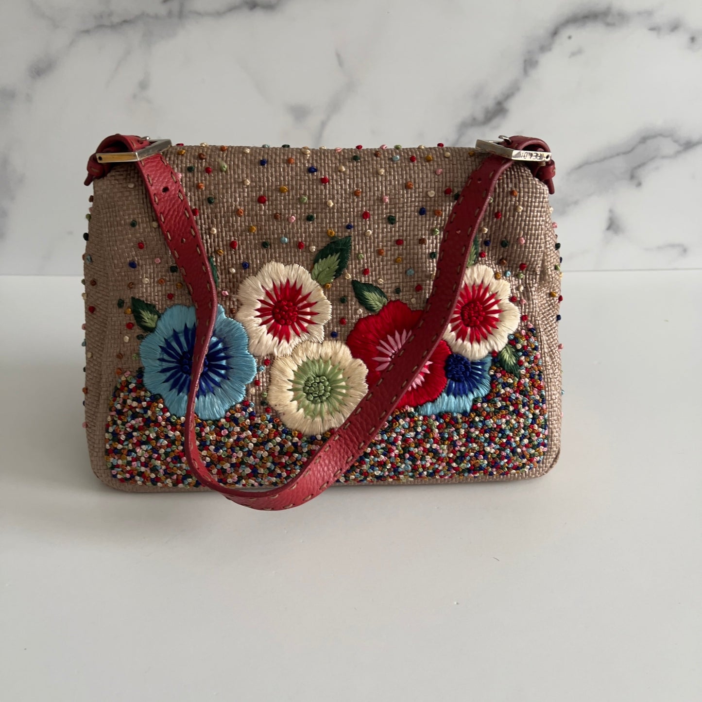 Fendi Selleria raffia floral embroidered mamma baguette.