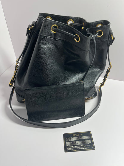 Chanel bucket black leather gold ball shoulder bag