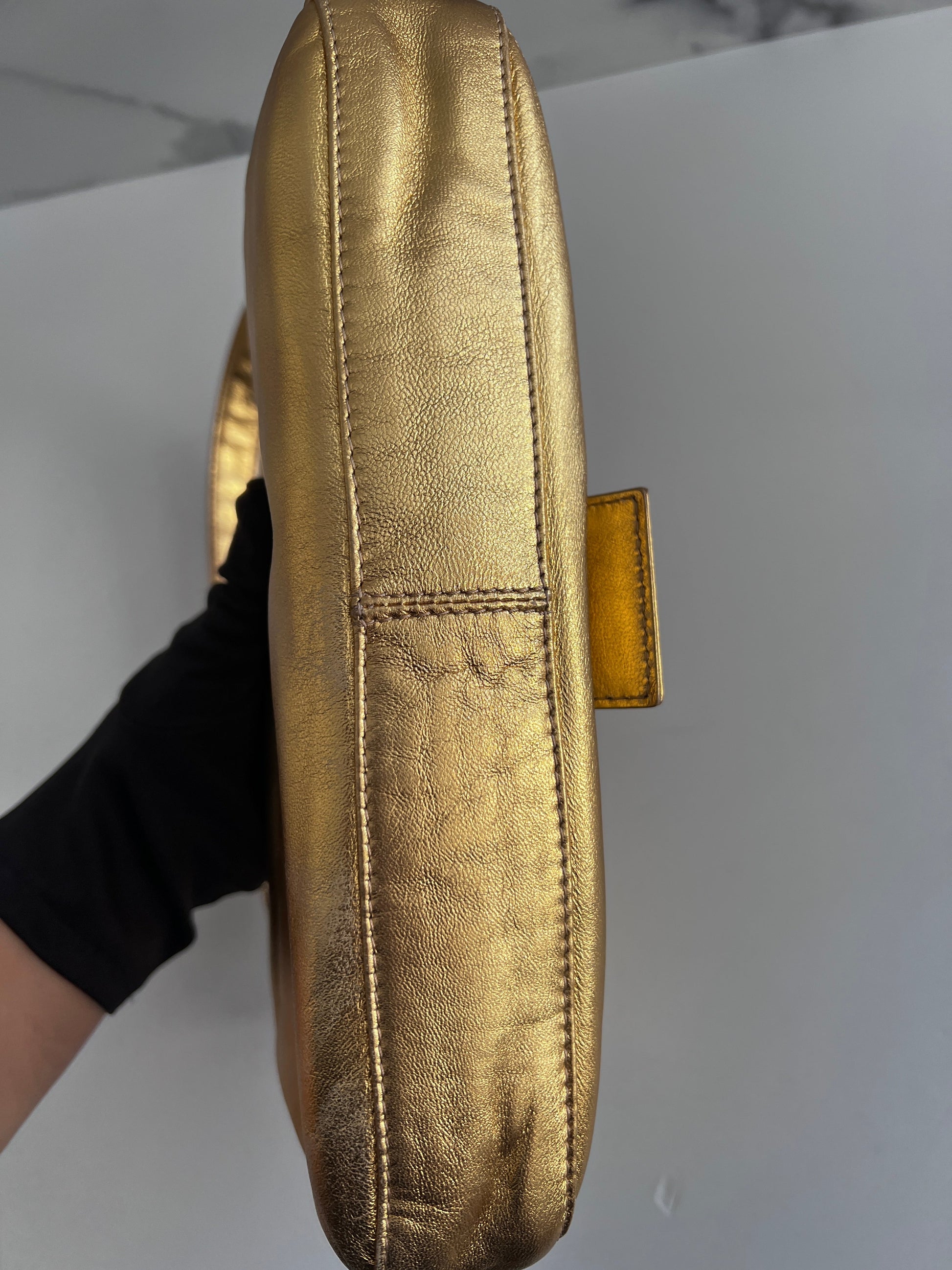 Classic vintage Fendi gold baguette