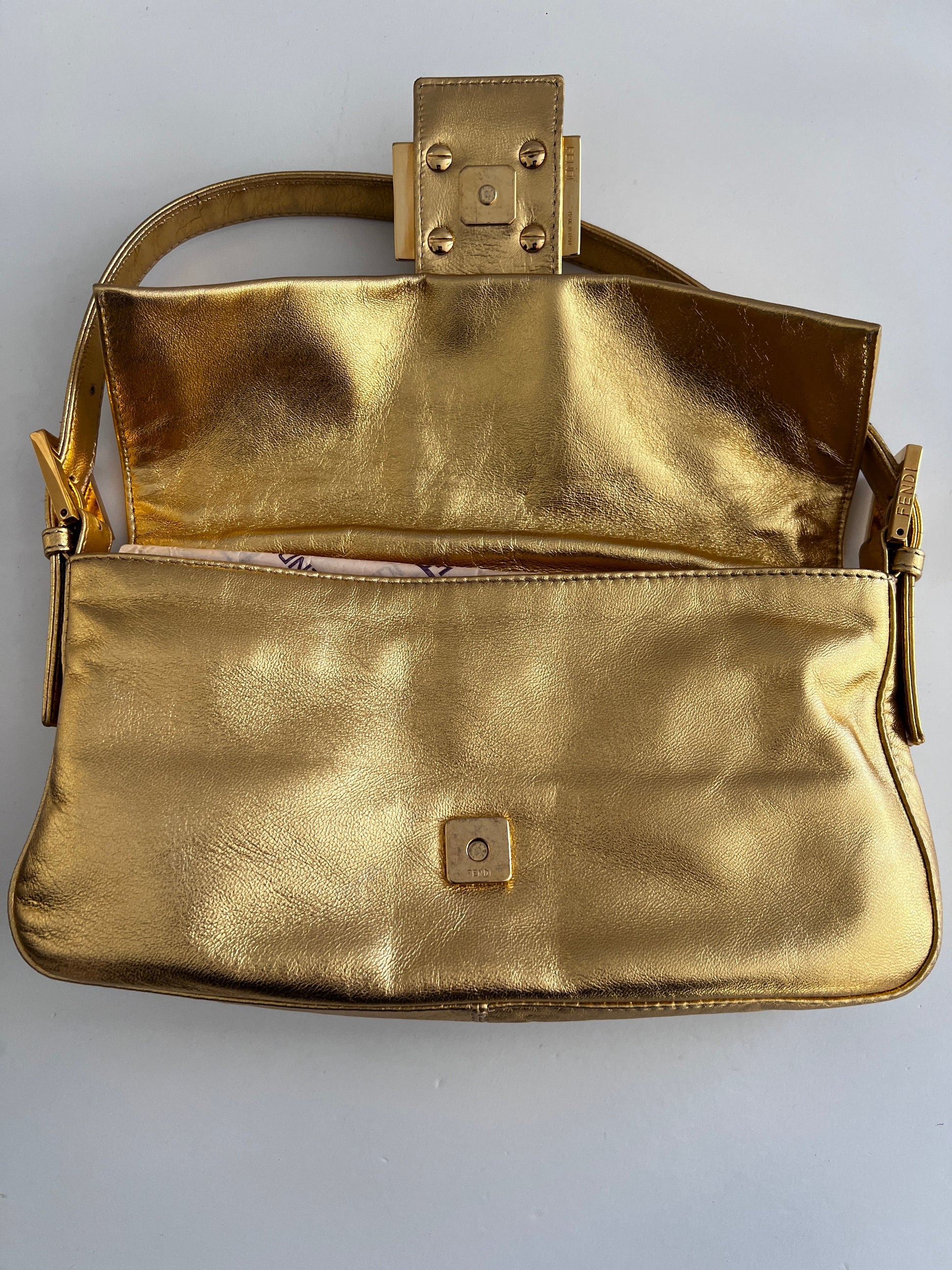 Classic vintage Fendi gold baguette