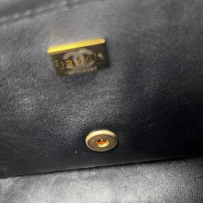 Chanel 2023 medium woven flap bag