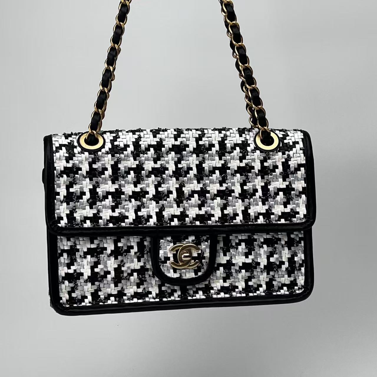 Chanel 2023 medium woven flap bag