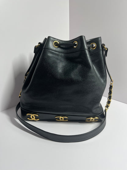 Chanel bucket black leather gold ball shoulder bag