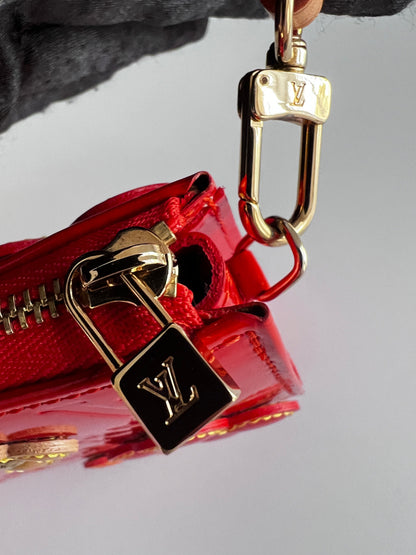 NWOT! Louis Vuitton Orange Sunset Monogram Vernis Lexington Fleurs Pochette Bag