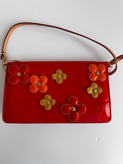 NWOT! Louis Vuitton Orange Sunset Monogram Vernis Lexington Fleurs Pochette Bag